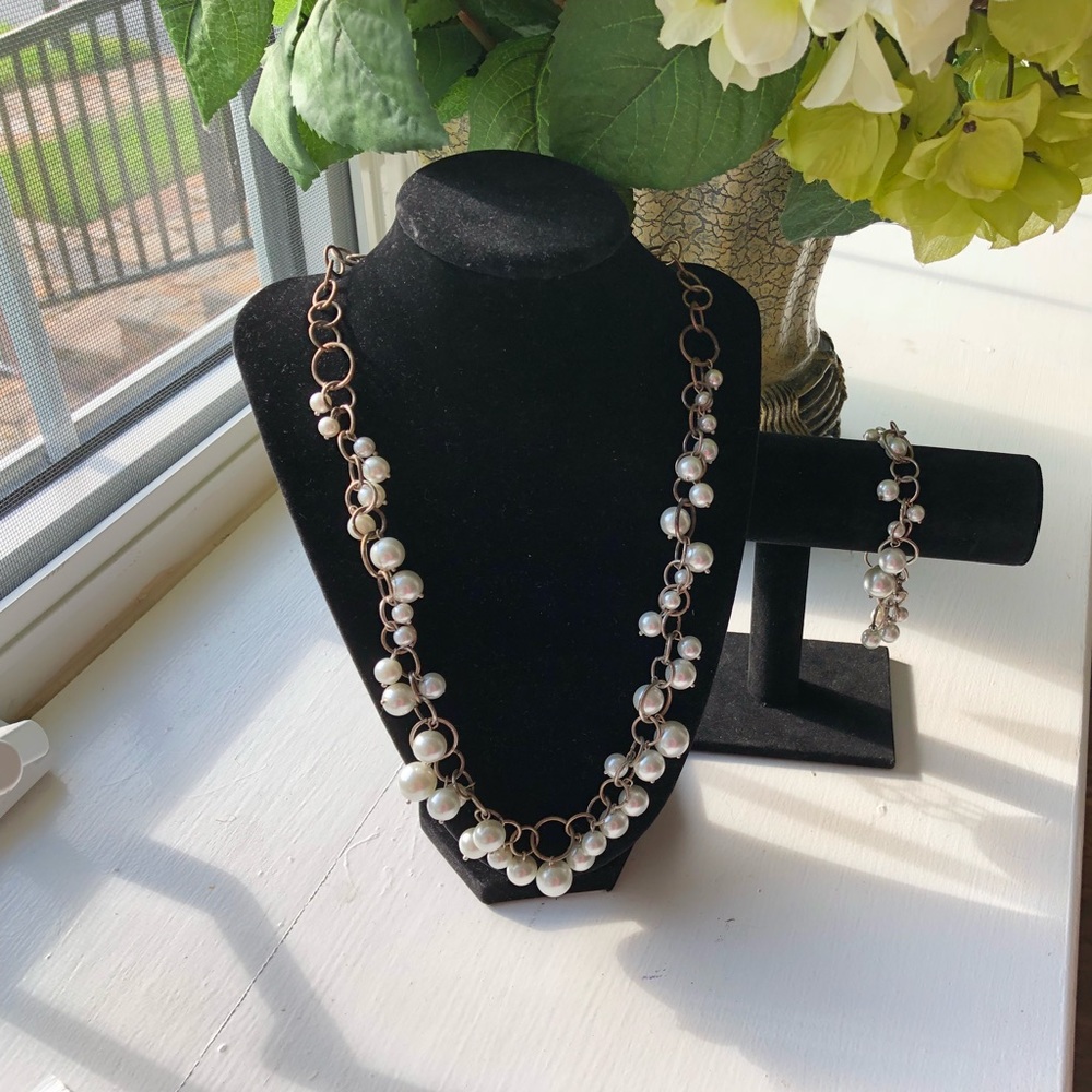 Necklace and bracelet.
